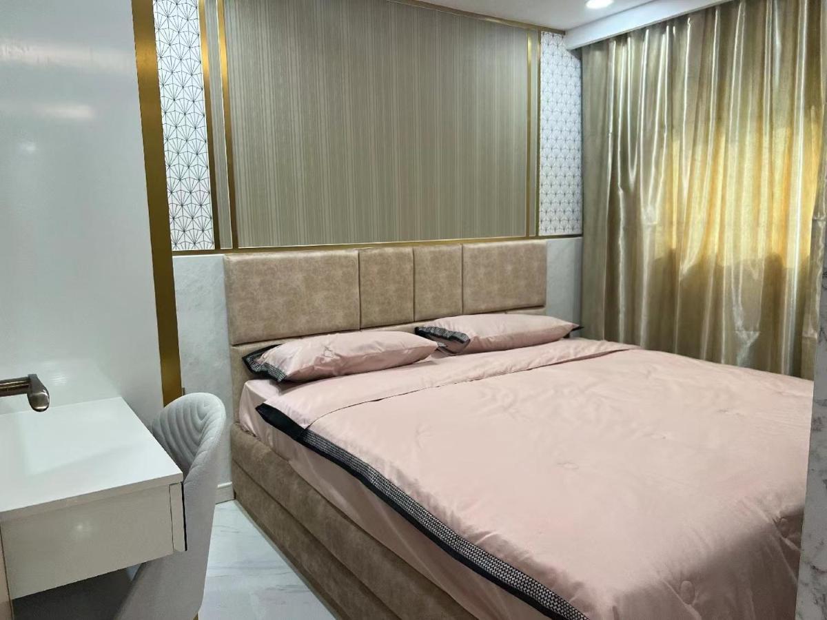 Romantic Beach Apartment芭堤雅水系高档酒店式公寓可做饭 Джомтиен Бийч Екстериор снимка