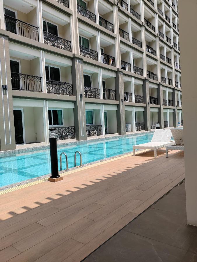 Romantic Beach Apartment芭堤雅水系高档酒店式公寓可做饭 Джомтиен Бийч Екстериор снимка